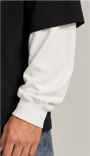 Close-up of Halftone Layered Tee showing black short sleeve over white long sleeve
