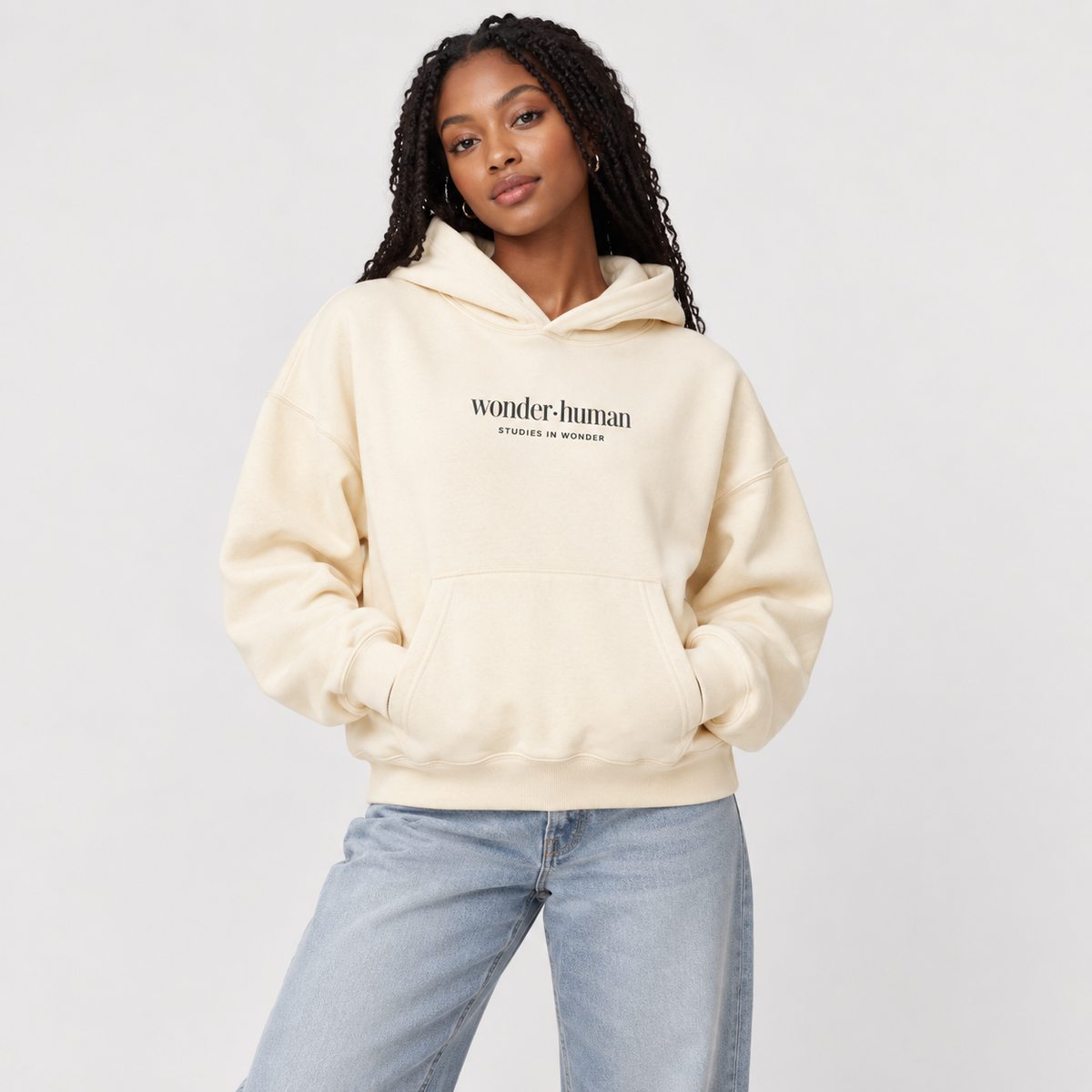 Female model wearing Apricot Star Index Hoodie, front view